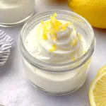 Delicious no-bake lemon mousse in a glass topped with lemon zest